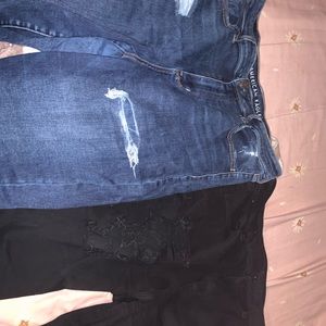 Two pairs of American eagle jeans ,